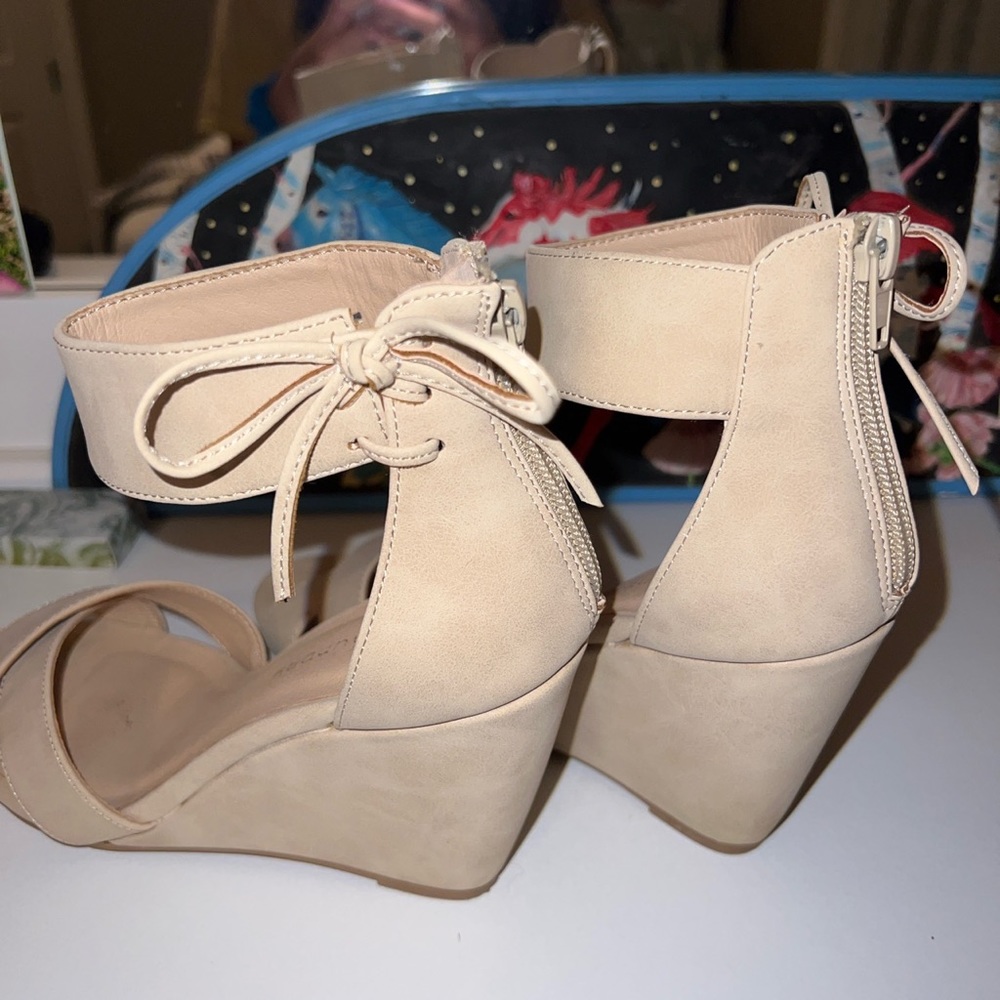 Like new cream color heals. Only wore them ONCE for prom. Super comfortable